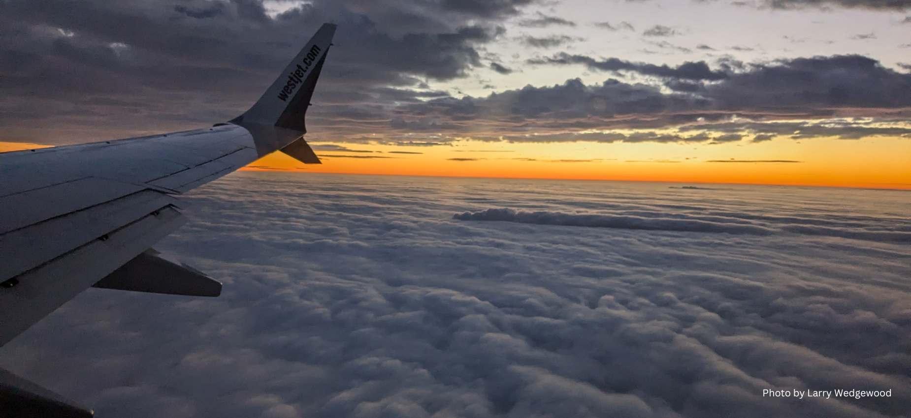 Flying to belize Westjet wing a 30,000 feet
