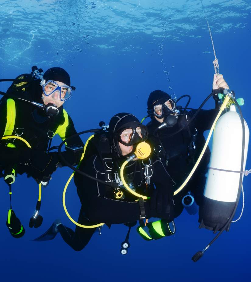 Divers doing a safety stop